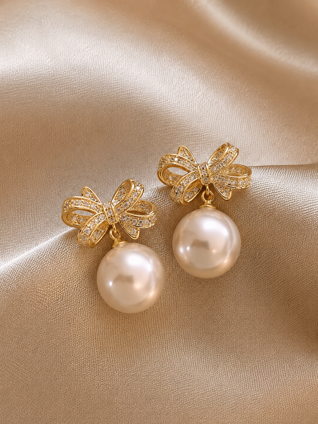 Crystal Bow & Pearl Drop Earrings – Gold-Toned